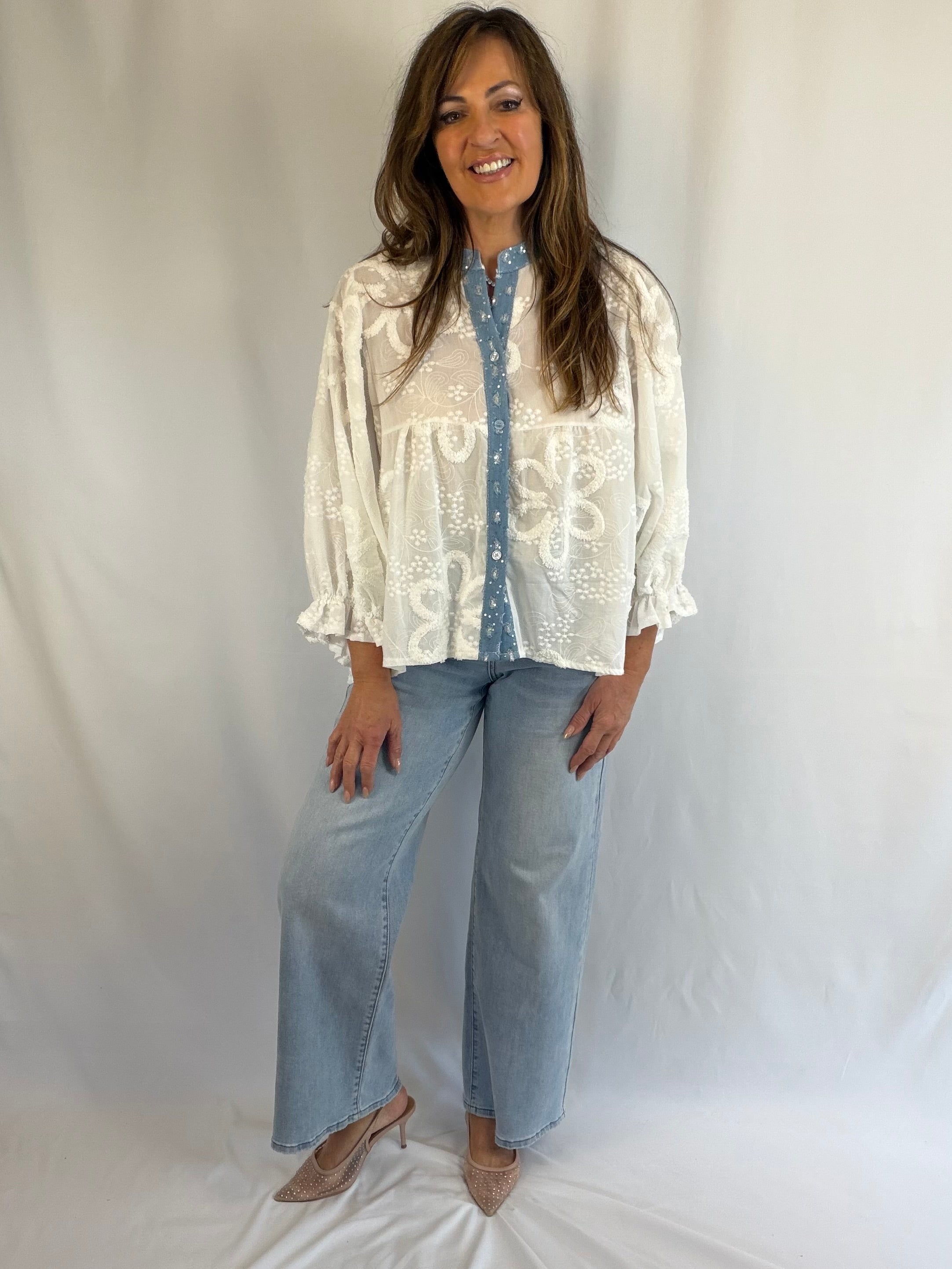 White batwing blouse (with denim and sequin detail)