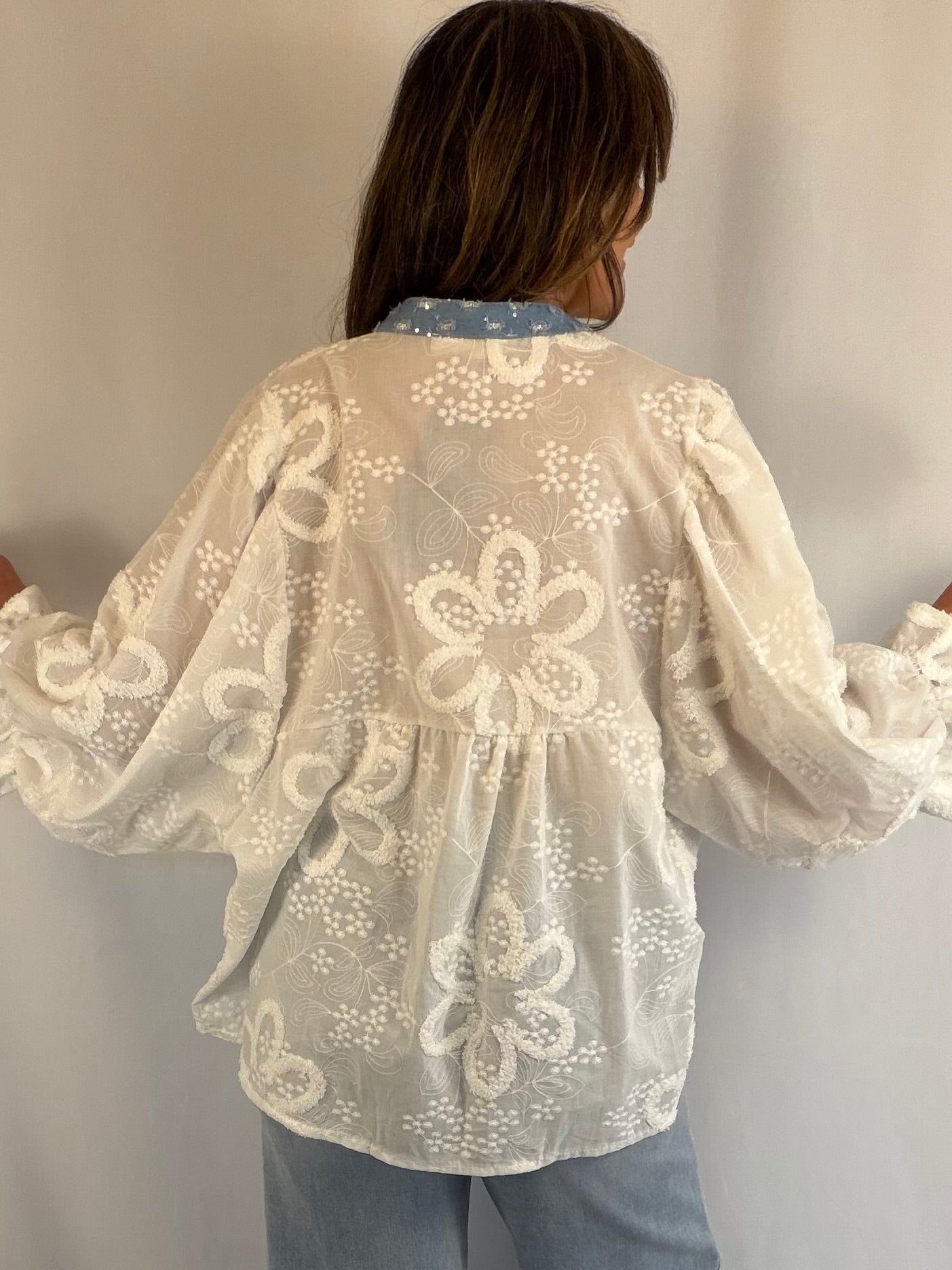 White batwing blouse (with denim and sequin detail)