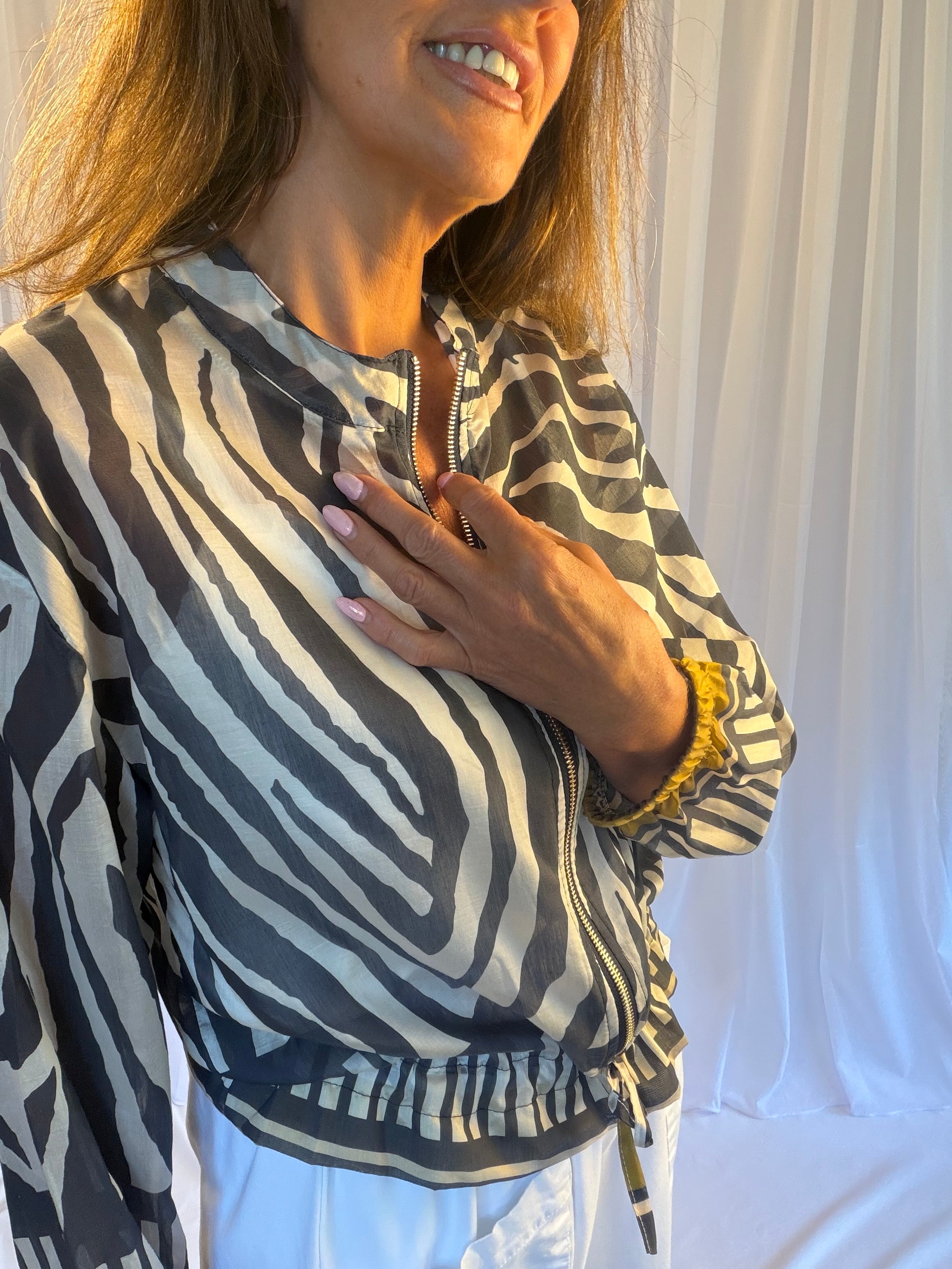 Zebra print bomber jackets